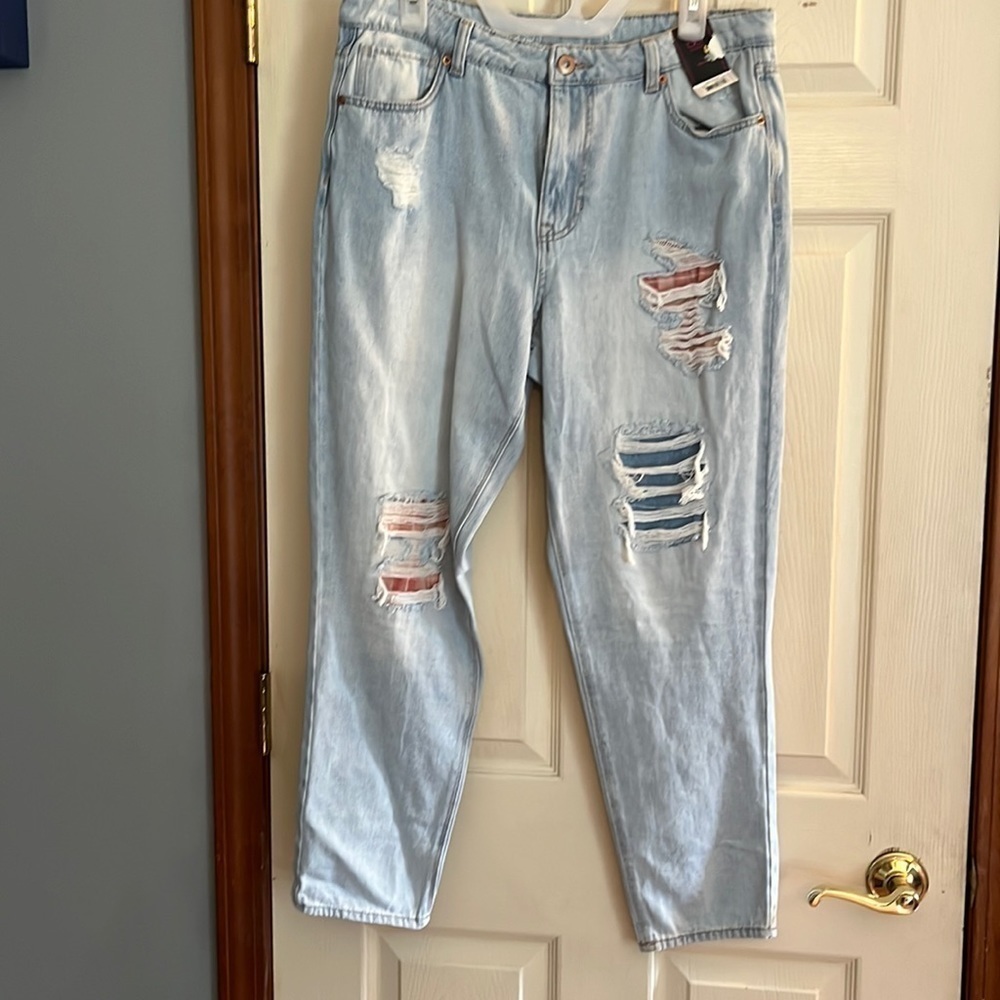 NWT hi rise mom Jean,  light washed, distressed with  patches. Size 13.